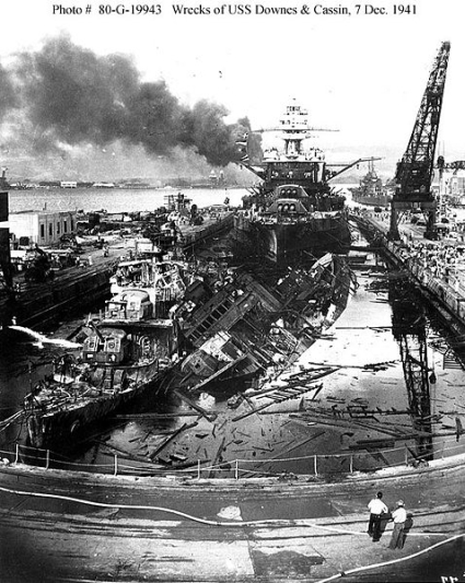 USS Pennsylvania, behind the wreckage of the USS Downes and USS Cassin.