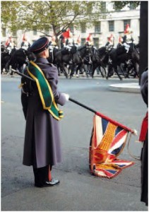 Trailing the flag at a British Parade, a courtesy to the monarch.