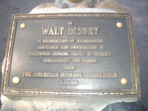 Plaque at the base of Frontierland's flagpole, dedicated to Walt Disney