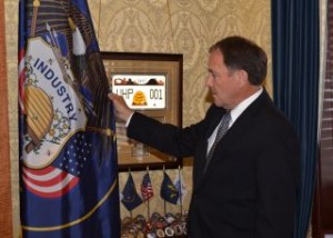 Governor with the flag